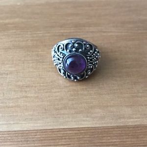 Siver ring with purple gem stone